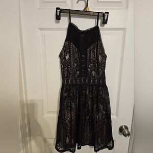Birdcage lace mini dress sz M Feminine with lining